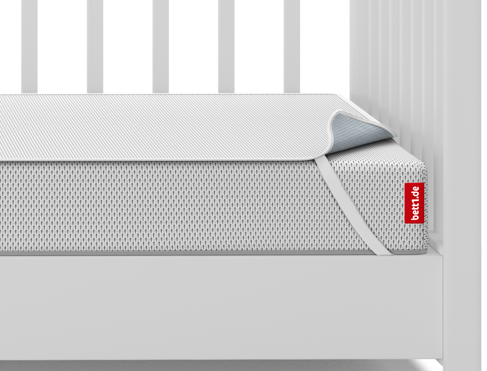 Die SuperBreeze® Kindermatratze mit dem Nässeschutz für Kinder-Matratzen darauf liegt in einem Babybett.	