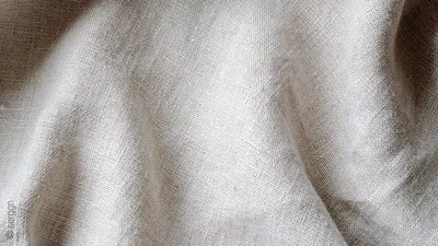 Nahaufnahme eines Spannbettlaken 180x200 aus Leinen.